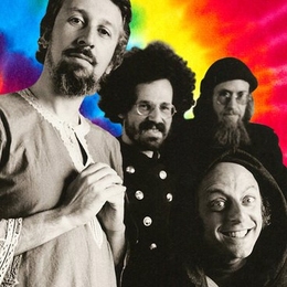 Charter members of the 'Fundamental Fysiks Group,' circa 1975. Standing, left to right: Jack Sarfatti, Saul-Paul Sirag, Nick Herbert; bottom corner: Fred Alan Wolf.