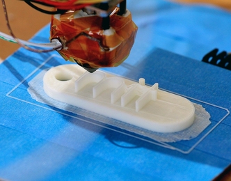 One of the 3-D printers at work in the Mediated Matter group at the MIT Media Lab.