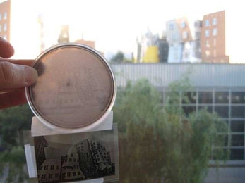 A bacterial photograph of the Stata Center. The bacterial strain was engineered to be sensitive to light, allowing the cells to serve as pixels in a photograph. Originally developed in the lab of Chris Voigt, the strain is used in the BioBuilder curriculum to illustrate the usefulness of modeling synthetic systems. Teachers can take photographs using the strain — as illustrated in this image of ...