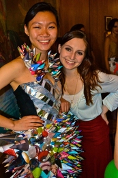Sophomore Angela Chu dons the winning outfit, which she designed along with sophomore Julianna Mello, that was made from old paper, plastic bags and aluminum. The dress beat out nine other designs modeled at Next House in the Trashion show on Dec. 3. 