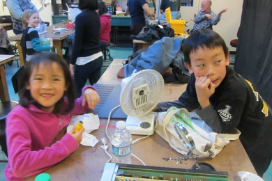 Emma and Alex Ling with the broken fan.