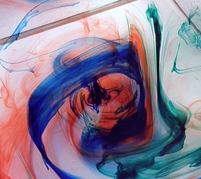 The 'weather in a tank' curriculum includes several rotating tank experiments, which are designed to help students understand how Earth's atmosphere and oceans work. An image from the dye stirring experiment is shown here.