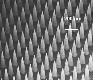 Many of the MEMS developed by principal research scientist Luis Fernando Velásquez-García — from thrusters for tiny satellites to systems for spinning out flexible functional materials — involve dense arrays of tiny semiconductor tips, like those shown here.