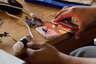 In a small project they worked on together, members of Next Make built functioning computer mice out of Altoids tins.