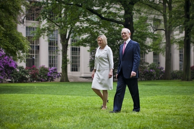 Reif and his wife, Christine, take a moment to stroll through Killian Court in front of MIT&#39;s large dome and Lobby 10, where a community reception was held.