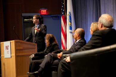 Sam Madden, an associate professor in the Department of Electrical Engineering and Computer Science at MIT and co-leader of the 'bigdata@CSAIL' initiative, addresses the crowd at the initiative's launch on Wednesday. In the foreground, from left to right, are Computer Science and Artificial Intelligence Laboratory (CSAIL) Director Daniela Rus, Massachusetts Gov. Deval Patrick, MIT President Susan ...