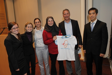 Members of the Sana AudioPulse team after winning the Mobile Health Challenge. From left to right: Lauren Scanlon (NEU/MIT), Anna Giselle Ribeiro (UFRN), Ana Maria Guerreiro  (UFRN), Marzyeh Ghassemi (MIT/CSAIL), GSMA organizer, Kenneth Paik (Harvard/MIT). 