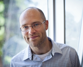 Russ Tedrake, an associate professor in the Department of Electrical Engineering and Computer Science.