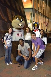 Several students received the opportunity to take a photograph with the Institute&#39;s beloved Tim the Beaver outside of the New England Aquarium.