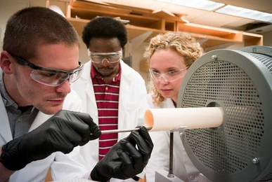 From left: Postdoc Alexis Grimaud, mechanical engineering graduate student David Kwabi and materials science and engineering graduate student Kelsey Stoerzinger work in the laboratory of Associate Professor Yang Shao-Horn, the Electrochemical Energy Lab.