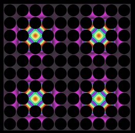 Thermal lattices, shown here, are one possible application of the newly developed thermocrystals. In these structures, where precisely spaced air gaps (dark circles) control the flow of heat, thermal energy can be "pinned" in place by defects introduced into the structure (colored areas).