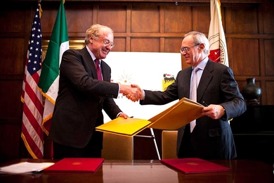 Eni CEO Paolo Scaroni, left, and MIT President L. Rafael Reif shook hands as they exchanged signed copies of the renewed partnership agreement between Eni and MIT.
