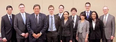 Energy Conference keynote speaker Bill Richardson, third from left, and MIT President L. Rafael Reif, right, pose with student organizers of the conference, including managing director Daniel Connell, second from left.
