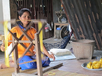 A silk weaver in the Sisaket province