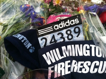 Charlotte Rocker MBA &#39;11, SM &#39;12 left her marathon number at the memorial site near the Stata Center.