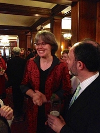 Amy Smith (center) talked with attendees at the April 23 ceremony.
