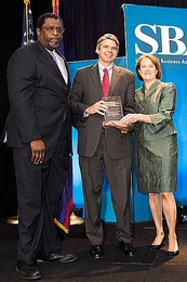 (Editor's note: photo added on Aug. 1, 2013): Eric Evans, director of Lincoln Laboratory, accepts the Eisenhower Award from Calvin Jenkins (left), deputy associate administrator for government contracting and business development, and Karen Mills, administrator, both of the Small Business Administration.