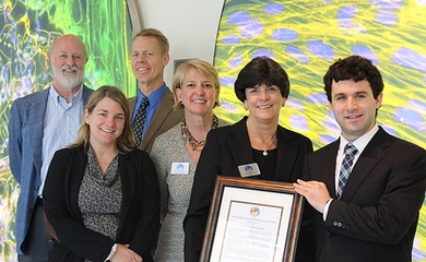 Awardee David Benjamin (right) with (from far left) advisor Richard O. Hynes, the Daniel K. Ludwig Professor for Cancer Research at MIT; Anne E. Deconinck, interim executive director of the Koch Institute; and Greg Safko, Susan Bancroft and Regina Bodnar of the Joanna M. Nicolay Melanoma Foundation
