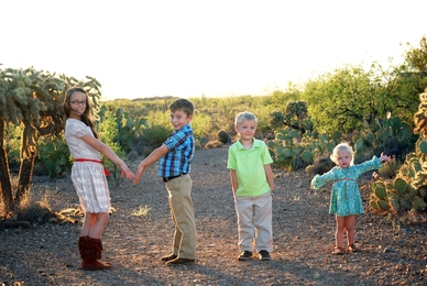 The children of incoming MIT LGO graduate student Nathan McMullin — Grace (10), Anderson (7), Gibson (5) and Lilla (2) — form the letters "MIT" outside their home in Arizona.