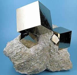 Pyrite, also known as fool&#39;s gold, forms cubic crystals that have a yellowish metallic sheen, sometimes leading prospectors to mistake it for gold.
