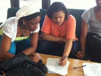 MIT student-mentors help SHINE students through a tailored math curriculum.