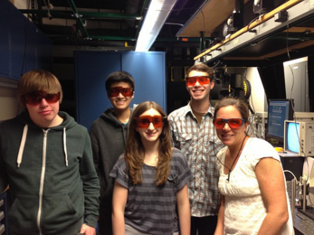 Lambda Project Lab Manager Jill Sewell (far right) with students (from left) Andrew James, Kenny Li, Alexa Beatrice, and Noah Gopen in the spectroscopy lab at MIT. 