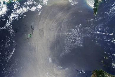 Surprisingly, internal waves can sometimes be seen clearly in satellite imagery (like in the above image of the Luzon Strait). This is because the internal waves create alternating rough and smooth regions of the ocean that align with the crest of the internal wave. Sunlight reflects the smooth sections, appearing as white arcs, while the rough sections stay dark.