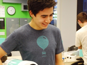 Freshmen, including Winter Guerra (pictured here), built loud-speakers and stereo-amplifiers of their own design in the new Cypress Engineering Design Studio to explore resonant systems and power conversion. 