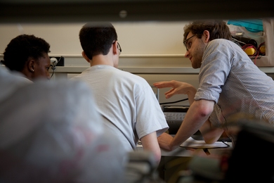 Instructor and EECS graduate student Joe Steinmeyer (right) employs a number of techniques to address stereotype threat in his electronics classroom.