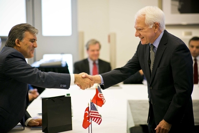 Turkish president Abdullah Gul (left) greets MIT Vice President Claude Canizares (right) in MIT's Building 10, May 30, 2014.