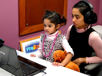 Parent and child using the Lookit website.