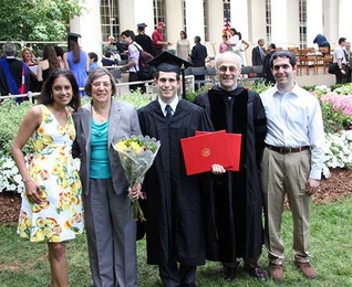 Todd Rosenfield (center) received two master’s degrees at Commencement on June 6, bringing the family’s MIT degree total to 10. With him are (left to right) his wife Runa; mother, Nancy; father, Don; and brother, Adam. Todd’s sister and fellow MIT graduate, Jennifer Rosenfield, was in California and could not attend.