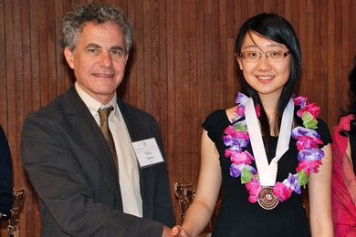 Dean Michael Sipser of the School of Science and Melody Guan, a two-time Math Prize for Girls bronze-medal winner, in 2010 and 2011.