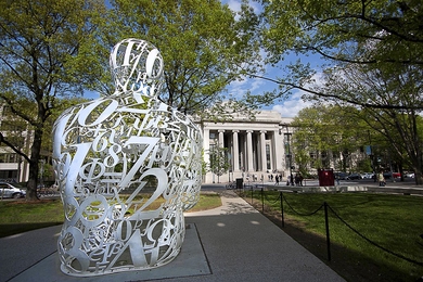 Jaume Plensa's "Alchemist" sits across Massachusetts Avenue facing MIT's main entrance. 