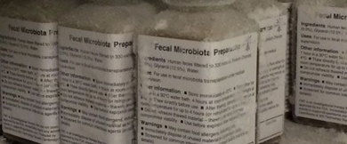 5 labeled bottles of fecal microbiota preparate show lists of text.