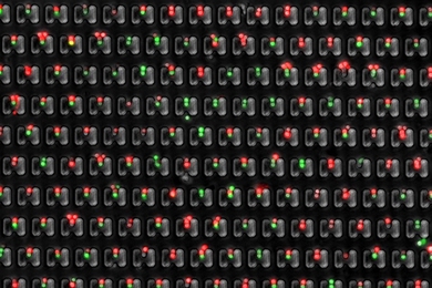 MIT researchers have designed a microfluidic device that allows them to precisely trap pairs of cells (one red, one green) and observe how they interact over time.