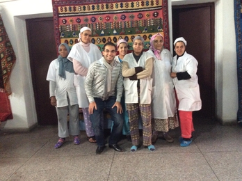 Zyad El Jebbari (third from left) with artisans from Coop Assafa, known for its handcrafted Moroccan rugs.