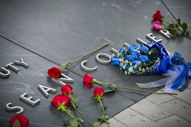 Situated on the site where Officer Sean Collier was killed on April 18, 2013, the Collier Memorial is composed of 32 blocks of granite that form a five-way stone vault. The smooth, curved vault contains the inscription: “In the line of duty, Sean Collier, April 18, 2013.”