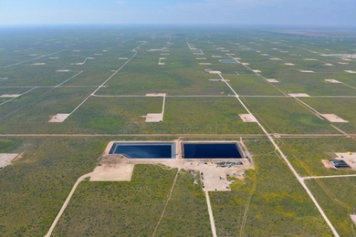 Gradiant's selective chemical extraction plant (shown here, near the pools of water) uses chemical reactions to remove specific contaminants from produced water to make clean brine. 