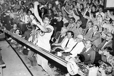 An excited crowd cheers for MIT students in 2.70 (the precursor of 2.007) as they compete in the final competition in 1979.