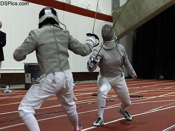 Senior Madison Douglas (right) compiled a 12-3 record in sabre at the Eric Sollee Invitational, helping the MIT women's fencing team to a 4-1 mark at the competition.