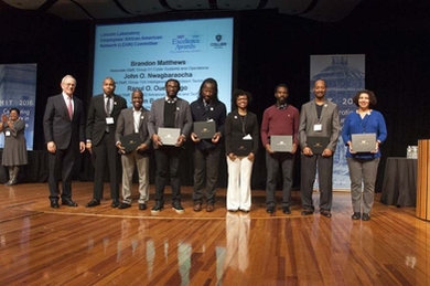 MIT Lincoln Laboratory African American Employees’ Network Committee members are presented with the Advancing Inclusion and Global Perspectives award from President L. Rafael Reif.