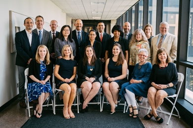 Top row (left to right): Robert Fadel, Dean Ian A. Waitz, Jim Long, Hsinhwa Lee, Ted Equi, Sandra Lopes, Joseph Baylon, Carolyn Carrington, Anthony Zolnik, Doreen Morris, Marlena Love, and Stephen Wetzel. Bottom row (left to right): Cathy Greene, Amy Bass, Sharon Leary, Bethany Walsh, Jessica Jones, and Kate Moynihan.