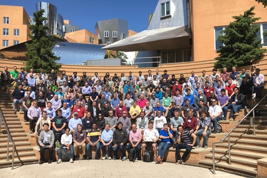 JuliaCon attendees gather in the amphitheater outside of MIT's Computer Science and Artificial Intelligence Laboratory.