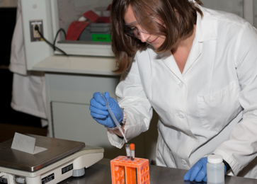 Erica Eggleton is working this summer in the lab of MIT Professor Krystyn Van Vliet on lithium manganese oxide (LMO) electrodes for lithium ion batteries. Here, she measures out carbon powder, a binder, and LMO, the active powder used in the battery electrodes.