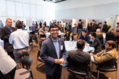 Partho Sengupta (center) was one of more than 30 invited guests at the Tata Center Symposium. 