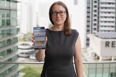 J. Cressica Brazier, a graduate student in the MIT Department of Urban Studies and Planning, displays a tool she’s developing to provide users with feedback on their personal energy consumption and carbon emissions.