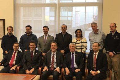 MIT Portugal Program faculty and PhD students stand with visitors (front row, from left to right) Portuguese Consul General in Boston José Rui Velez Caroço, Minister of the Economy Manuel Caldeira Cabral, Dean of the MIT School of Engineering Ian A. Waitz, U.S. Ambassador to Portugal Robert Sherman, and MIT Portugal Program Director Bruce Tidor.