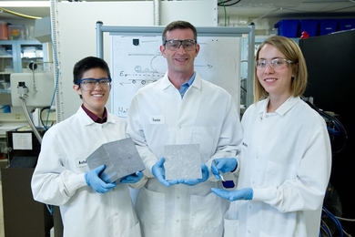 Left to right: Ashley Morishige, Tonio Buonassisi, and Mallory Jensen of the MIT Department of Mechanical Engineering have identified defects that may be causing a promising type of high-efficiency silicon solar cell to generate decreasing amounts of electricity in sunlight and have made recommendations to manufacturers that may help prevent the problem. Here, the researchers display a silicon bri...