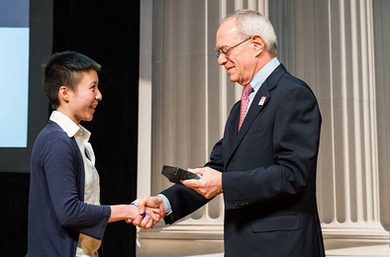 President L. Rafael Reif congratulates MIT senior Lorraine Wong, the 2017 Collier Medal Recipient.